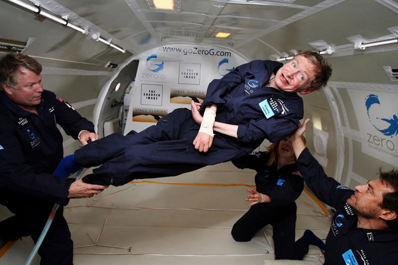 Stephen Hawking floating in zero g inside an aircraft