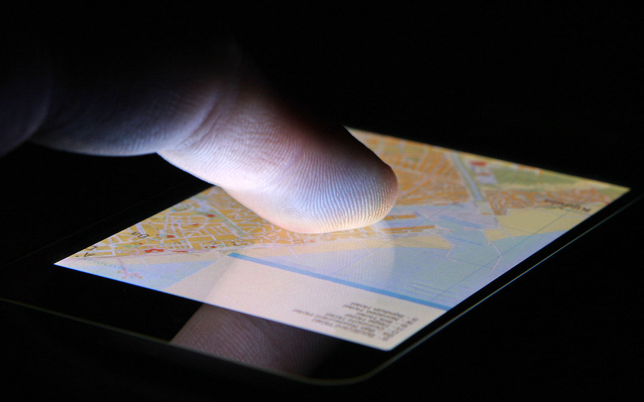 A finger on a touchscreen