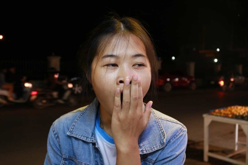 A woman yawning